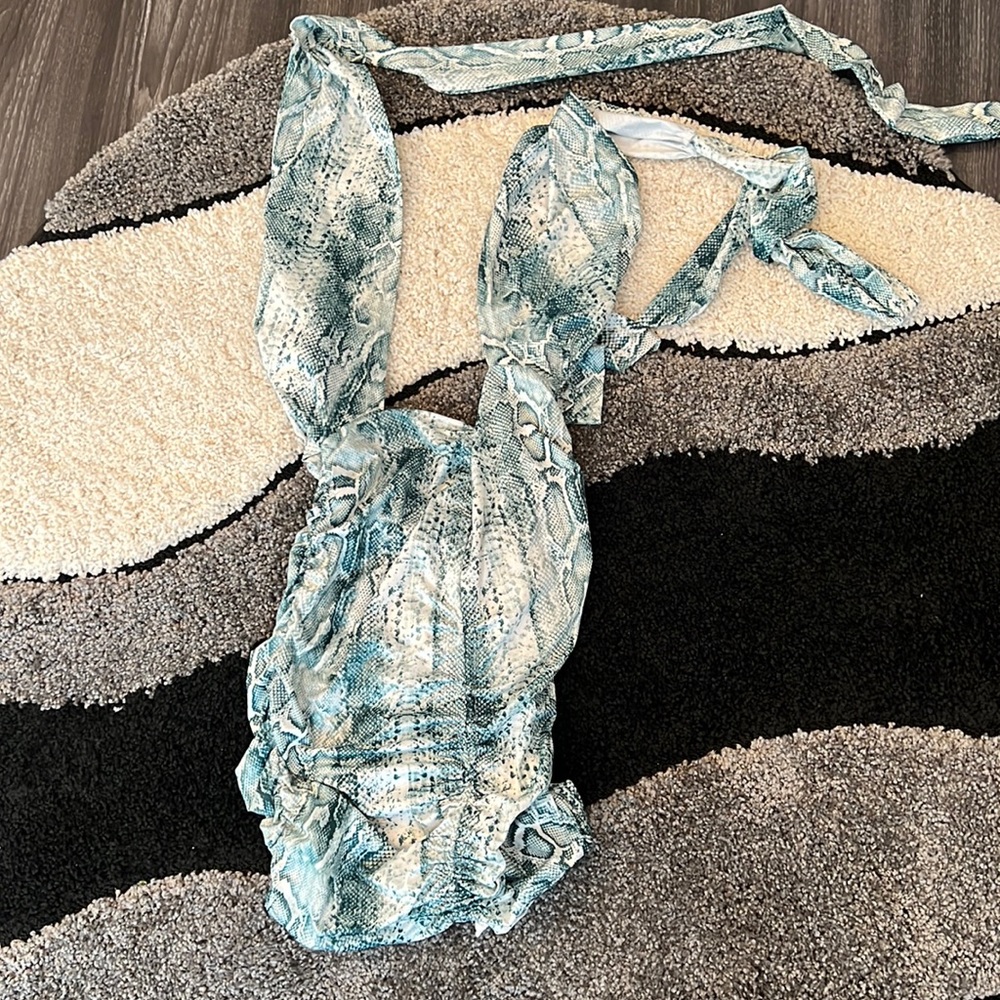 Green and white mini party dress. Halter tie back and top. Runched bottom.